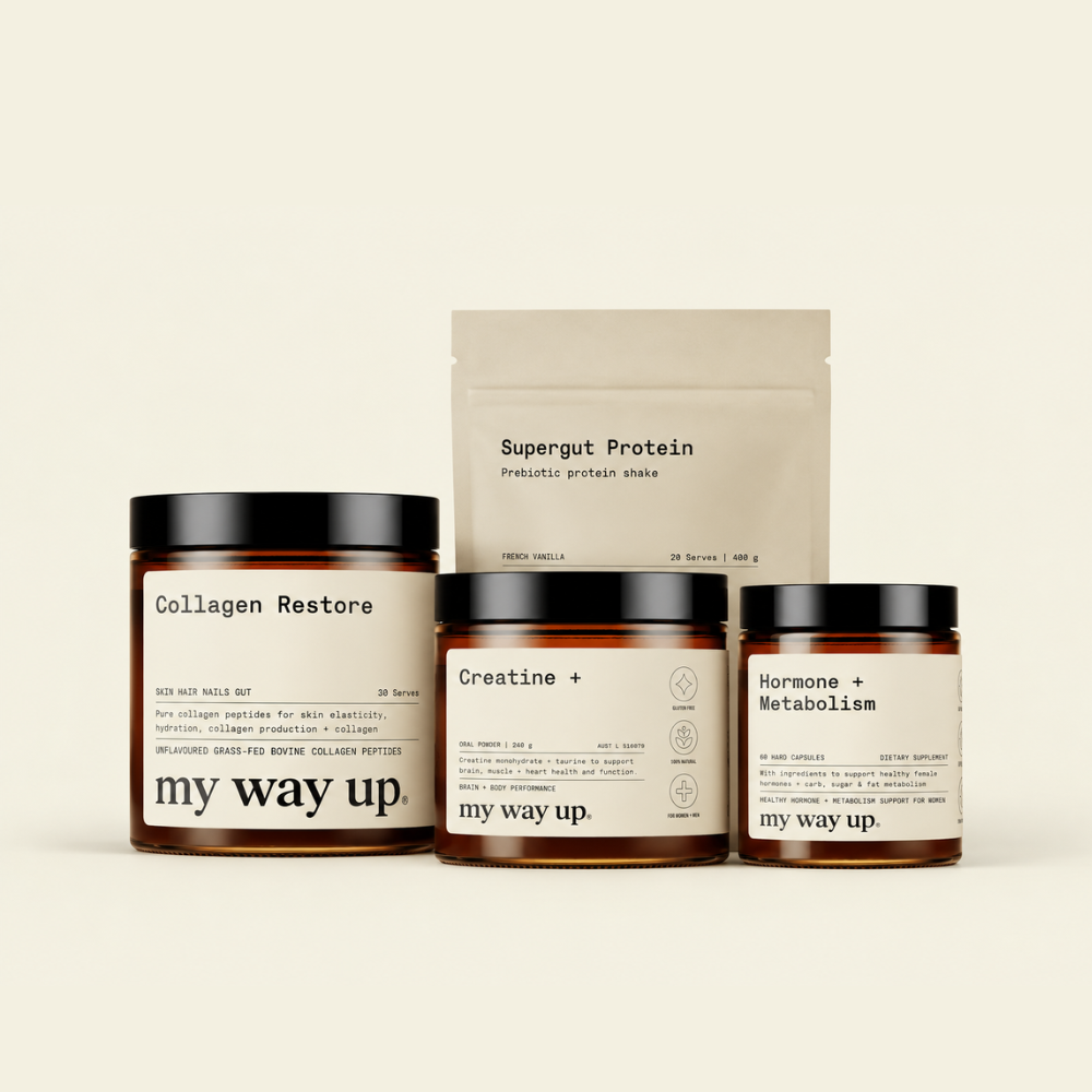 My Way Up product stack featuring Collagen Restore, Creatine+, Hormone + Metabolism, and Supergut Protein French Vanilla pouch, arranged together against a warm cream background.